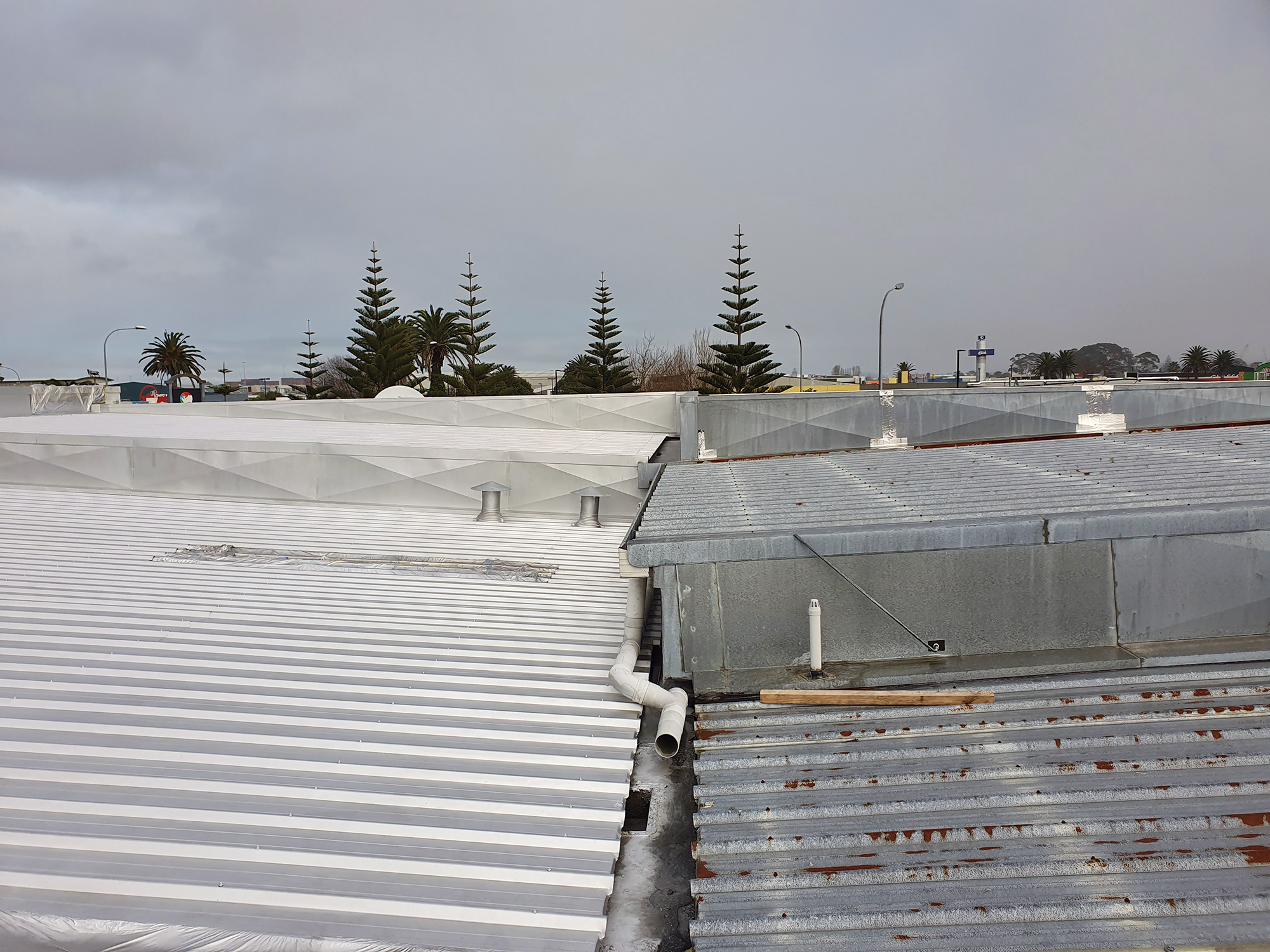 Rusty commercial roof repair - Re roof was not an option