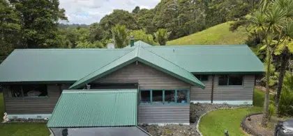 Restored worn coloursteel roof in Coatesville Auckland