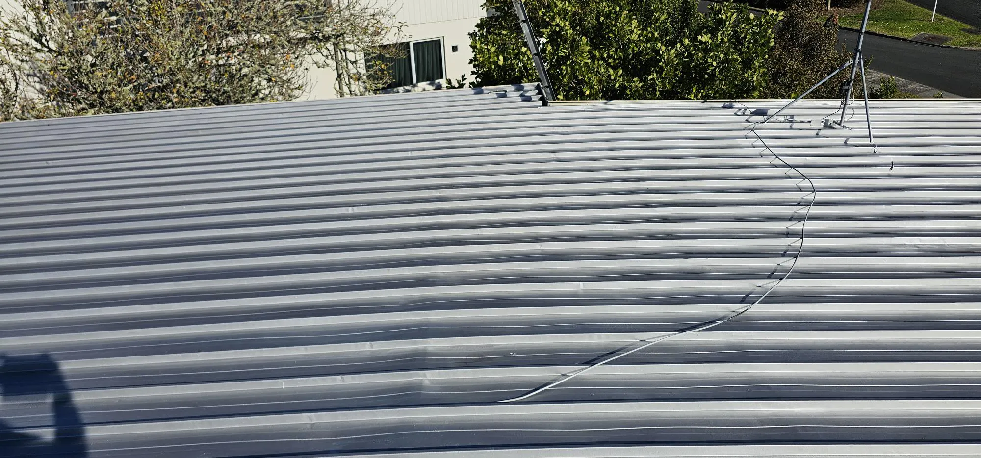 Rusty iron roof restored and protected close up after - Rusty iron roof restoration in Mairangi Bay