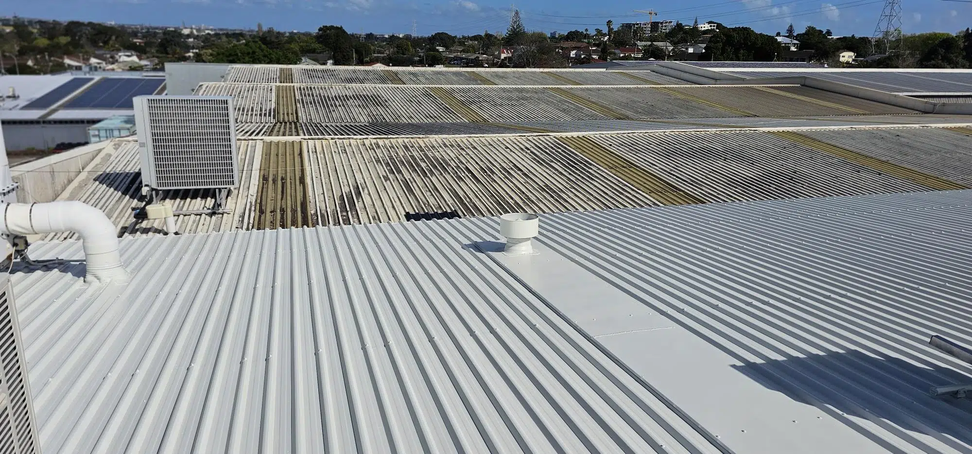 Commercial roof painting and restoration - Commercial Roof Maintenance
