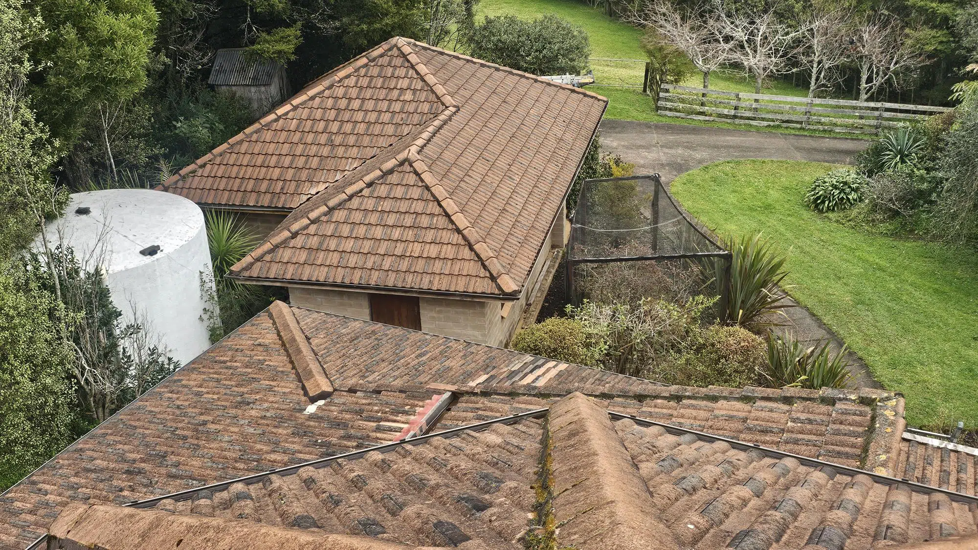 Wellsford concrete tile roof before restoration Wellsford concrete tile roof before restoration